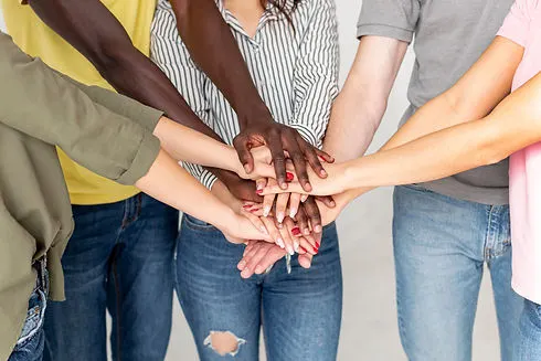 group-friends-with-hands-top-each-other.